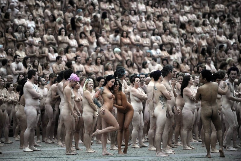 Naked girls among people