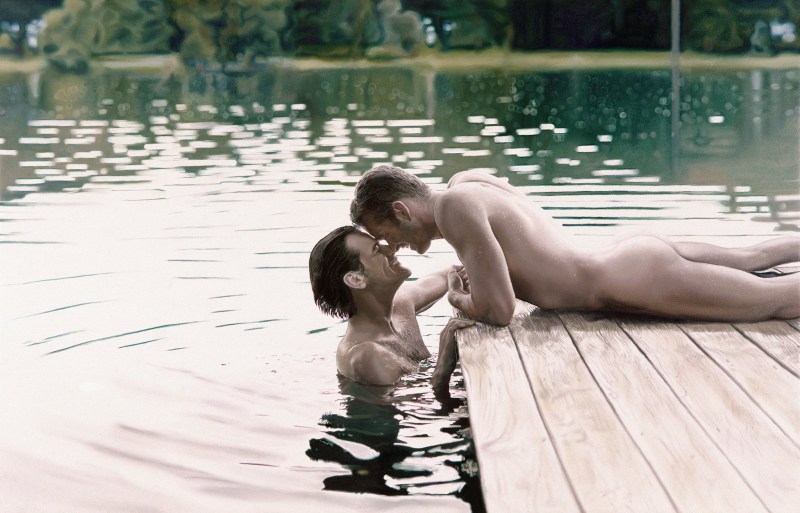 Naked guys in nature in water