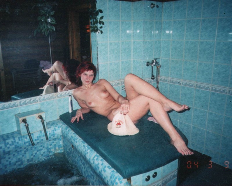 Naked women in a retro bathhouse