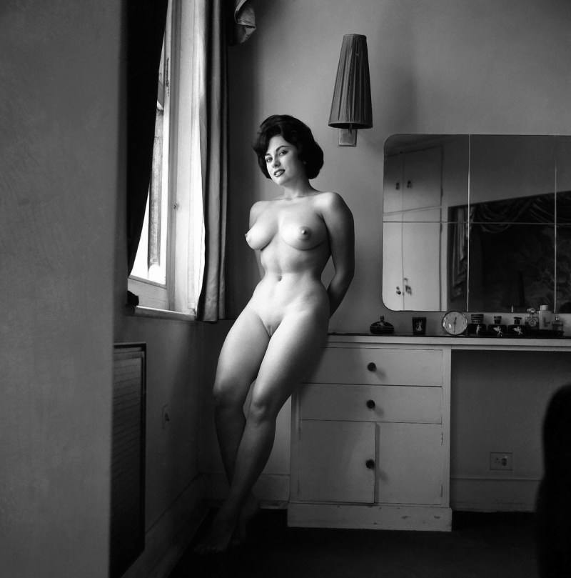 Naked women in chic chairs