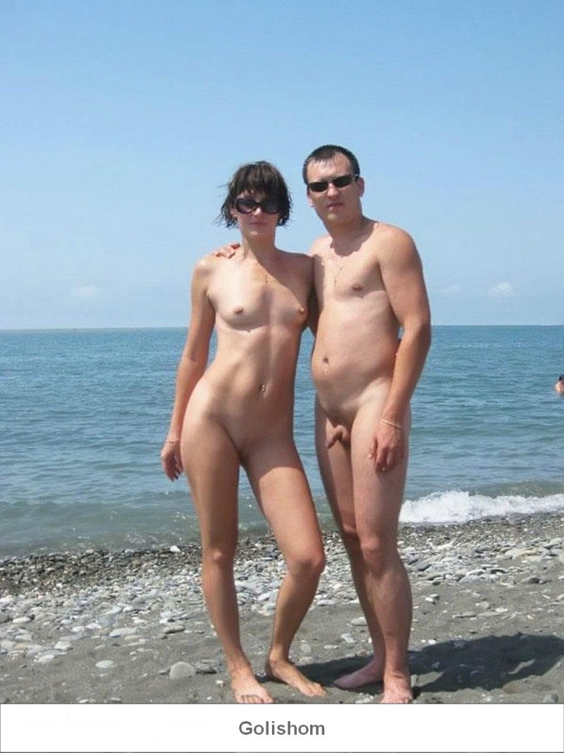 Naked men and women on the beach