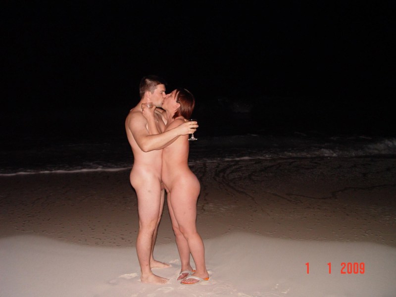 Naked girls on the beach with men