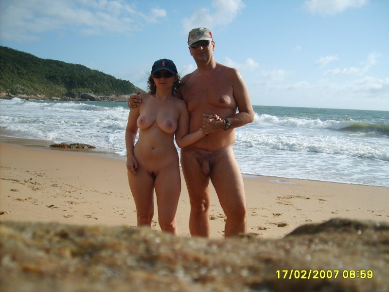 Guys and girls on a nudist beach
