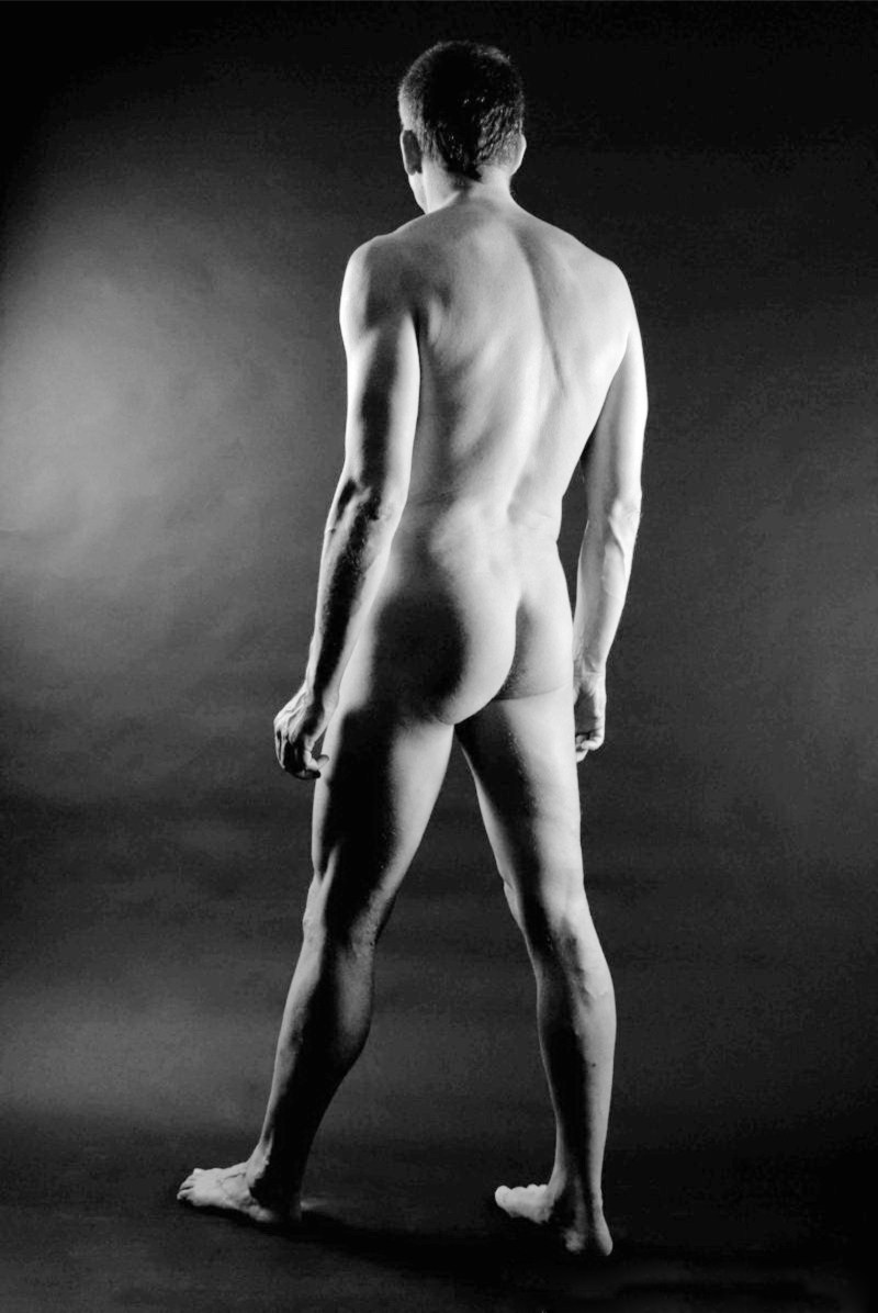 Naked guys pose an artist