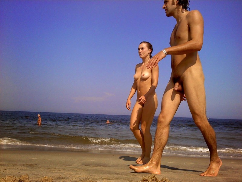 Naked guys on a wild beach