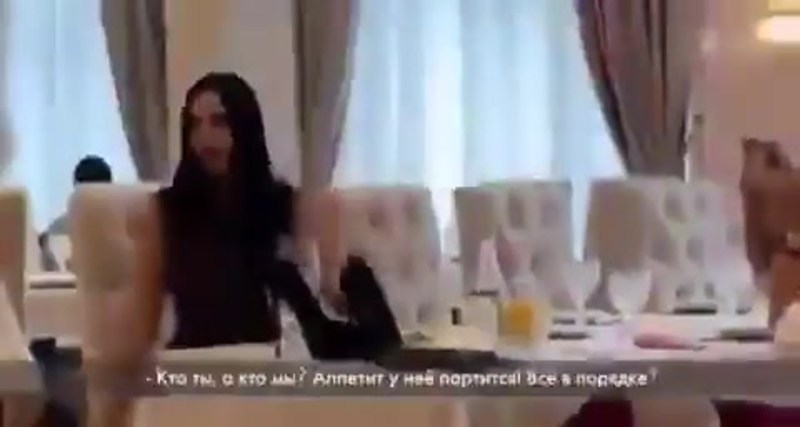 Victoria Romanets in a red dress