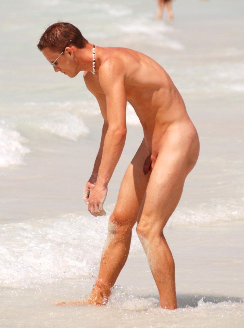 Young boys sunbathe naked