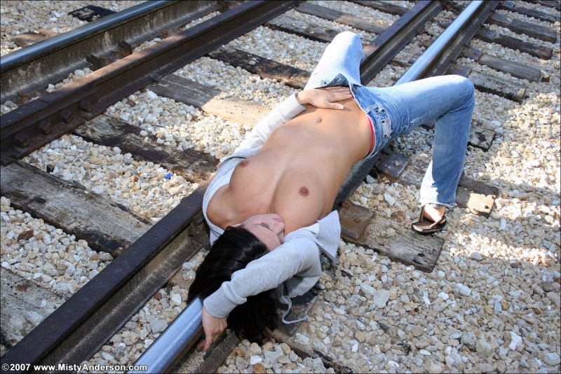 Girl naked on rails