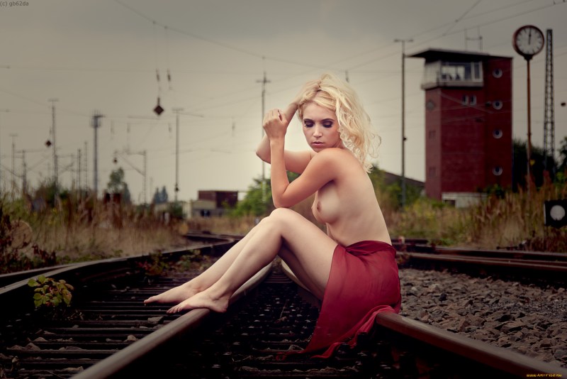 Naked women on rails