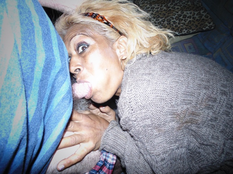 Homeless woman in her mouth