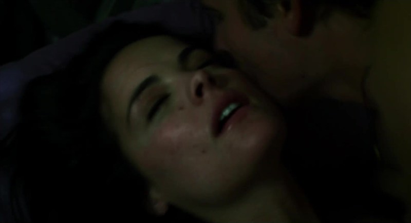 A woman enjoys a man