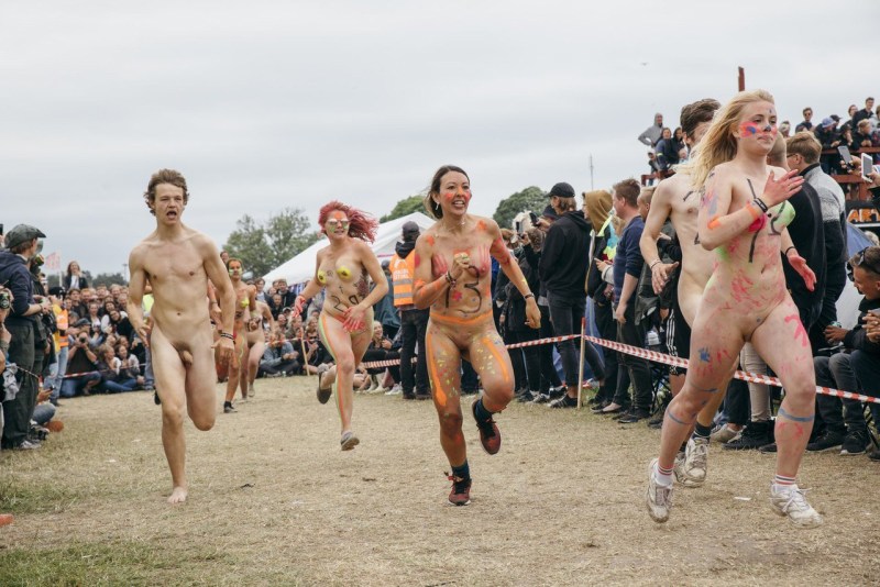 Parade of naked men and women