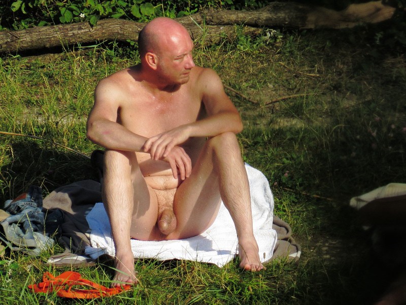 Naked elderly men on the beach