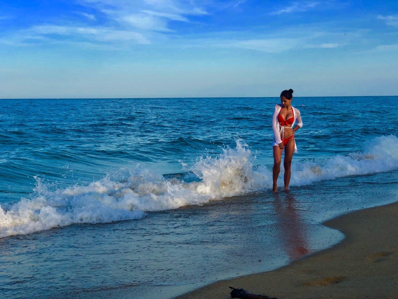 Naked near Christmas trees in the forest