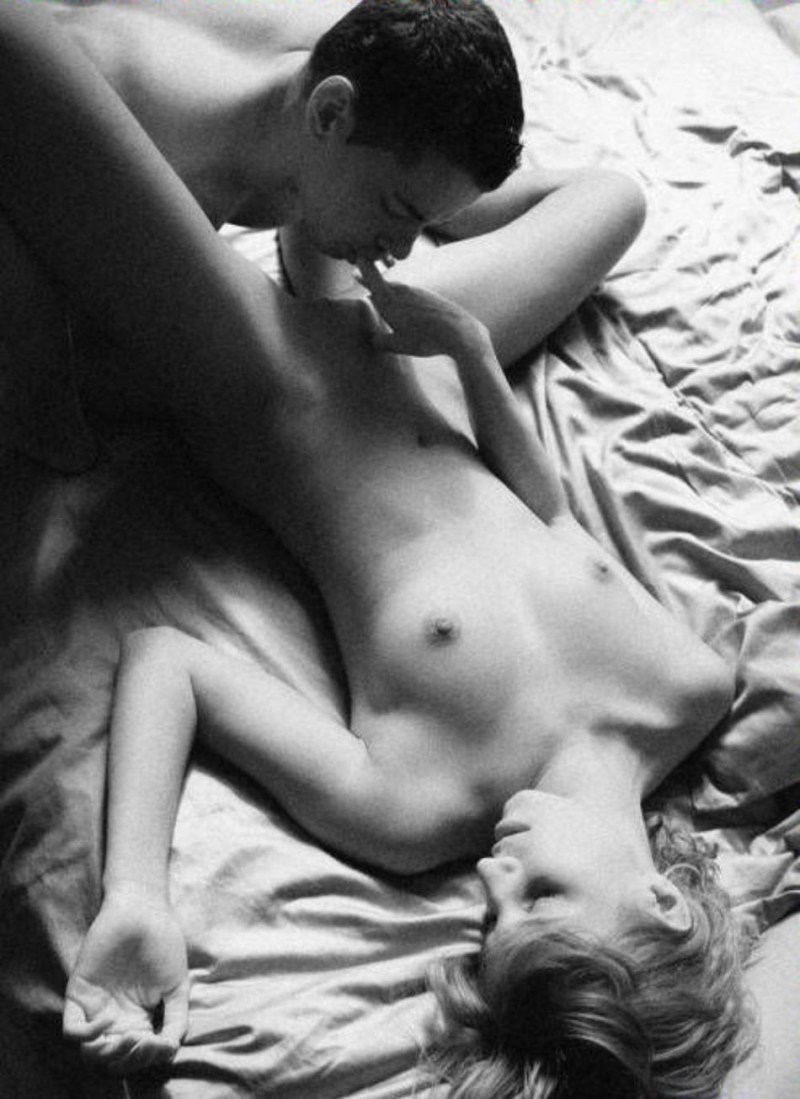 A young guy caresses a girl