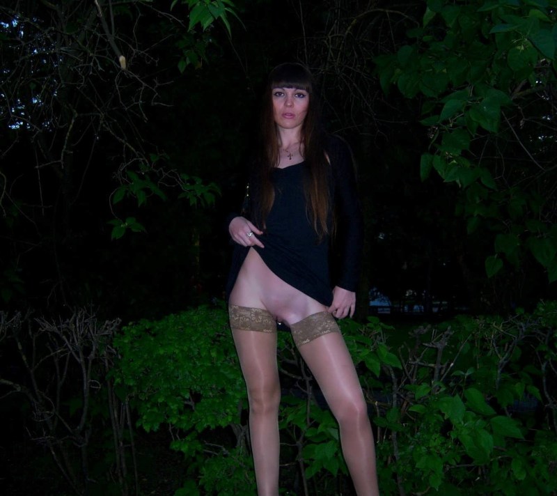 Wife in stockings in nature