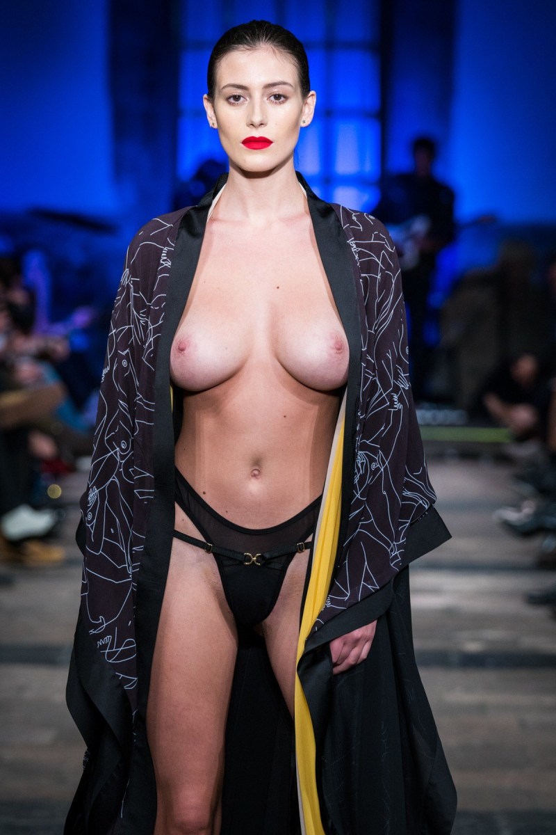 Naked fashion model on the catwalk