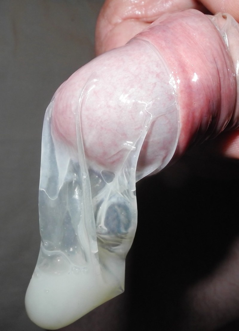 Male penis in condom
