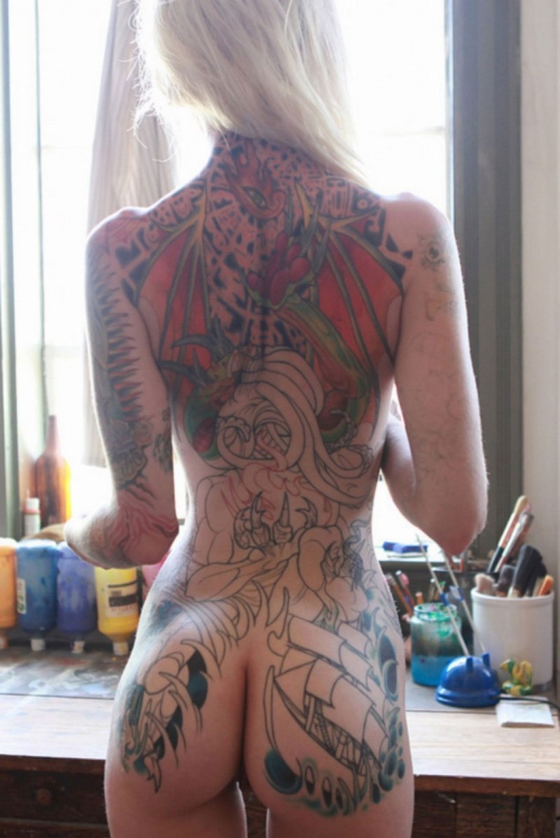Pornstar with tattoo on the whole back