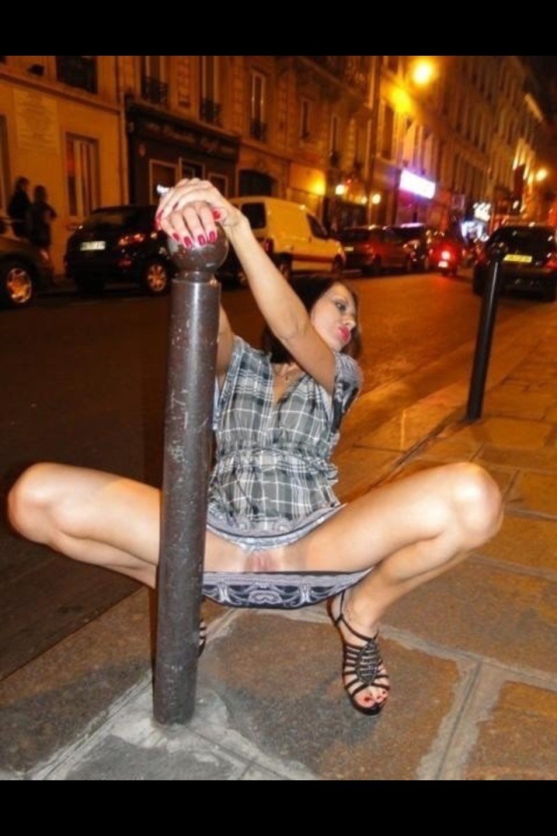 Woman without panties with a lifted skirt