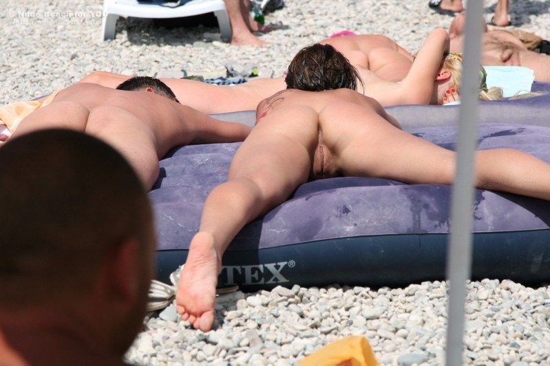 Spied asses on the beach