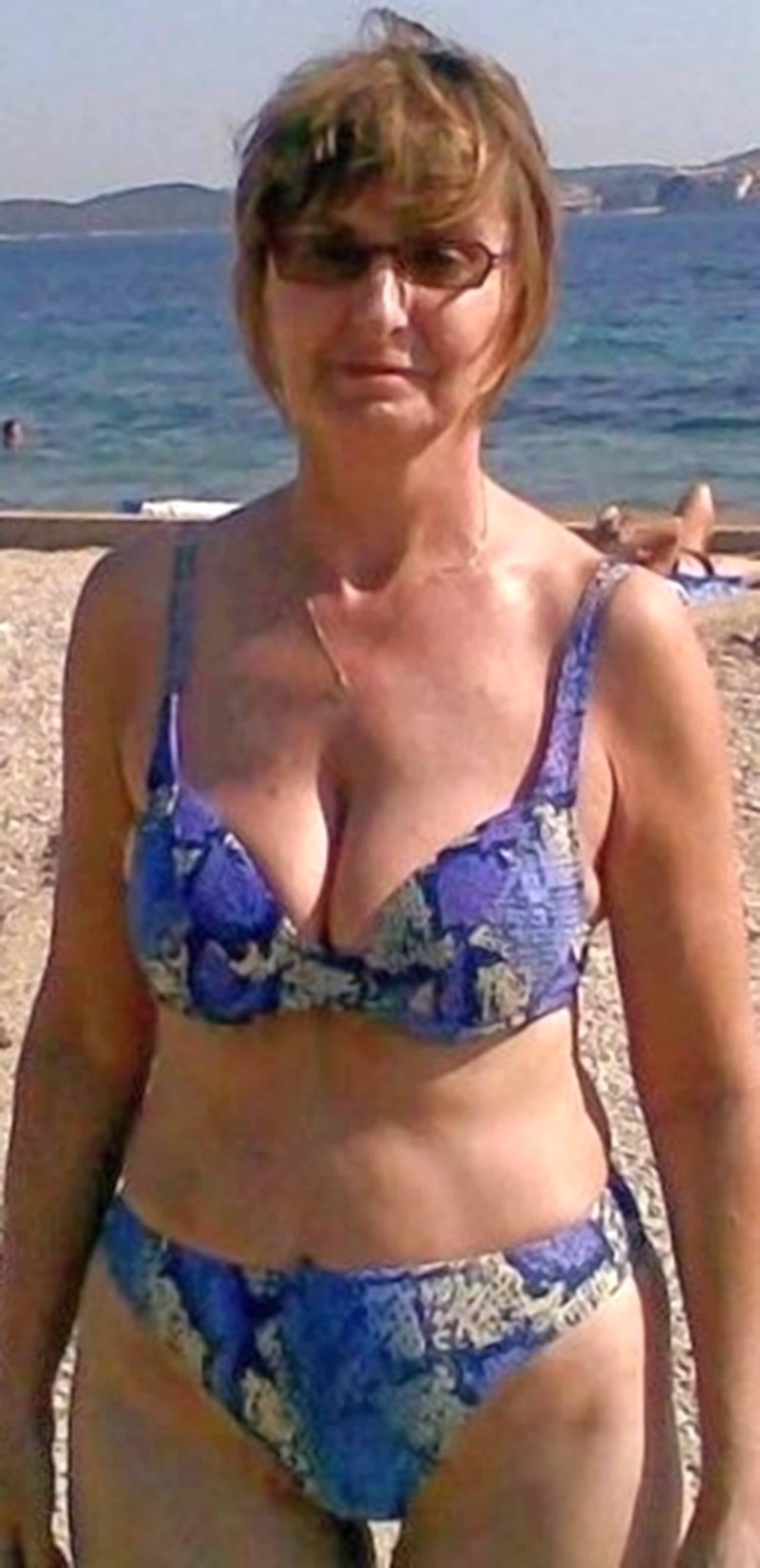 Elderly lady in a swimsuit