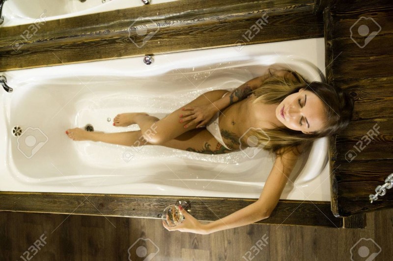 Woman in the bathroom in panties