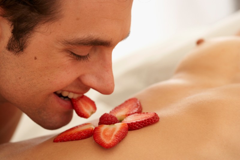 Strawberry with cream on the body