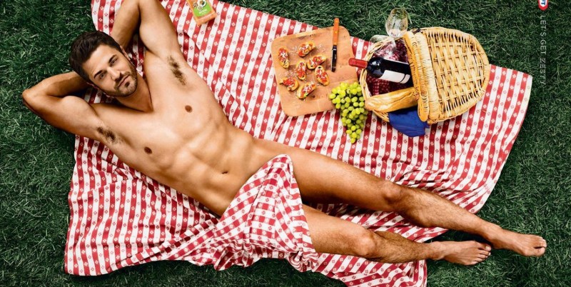 Naked man cooks breakfast