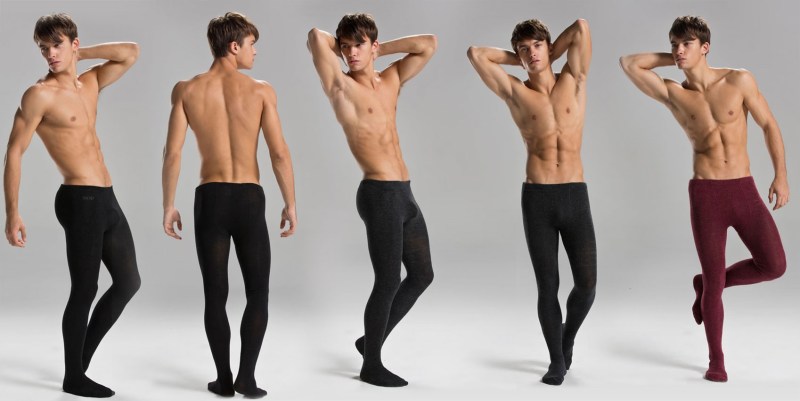 Brunette in stockings on the bed