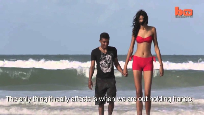 Large woman and small man