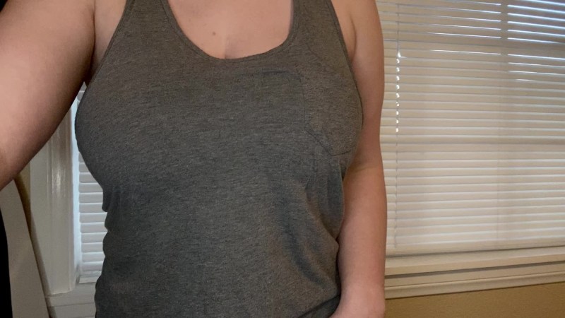 Big breasts in a tight T -shirt
