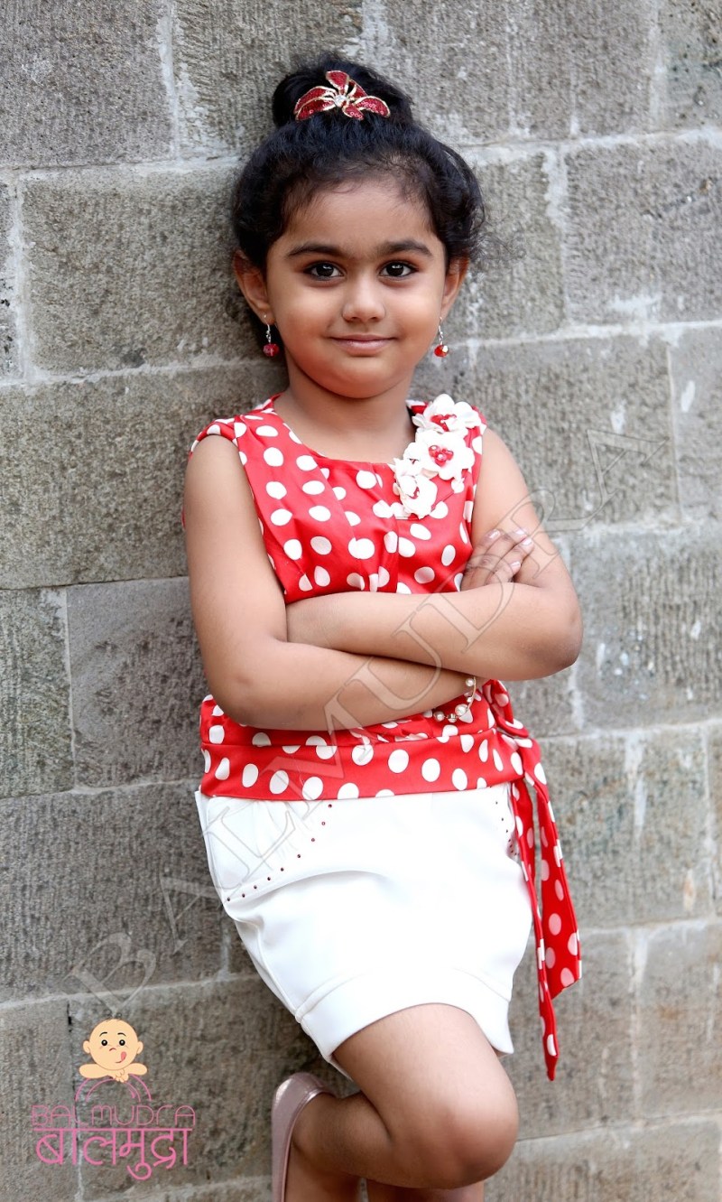 Indian little actress Girl with short black hair