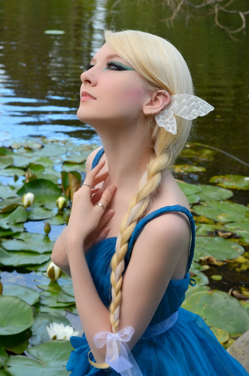 Girl with blond hair in a swimsuit