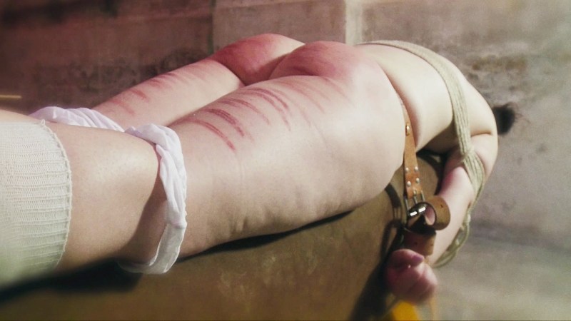 Cruel spanking of the girl BDSM