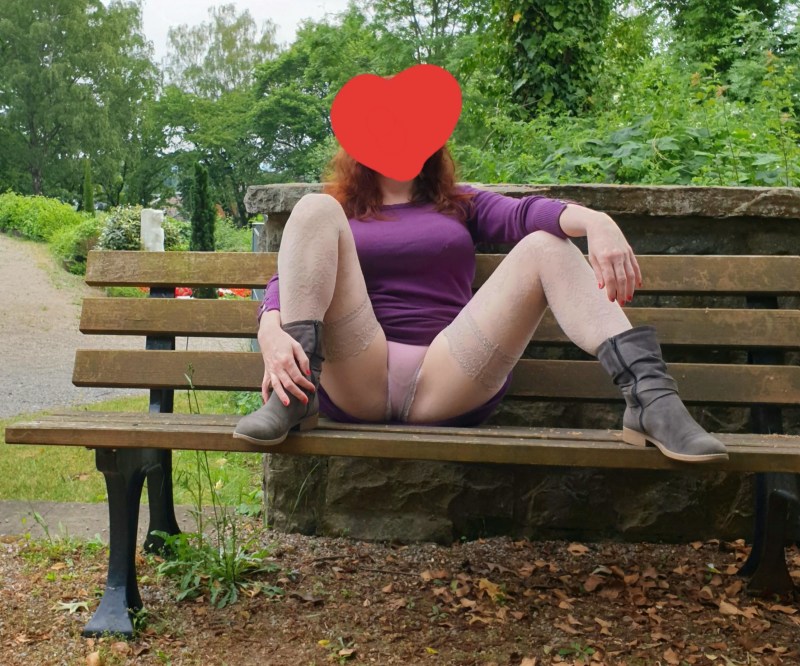 Naked in the park on a bench