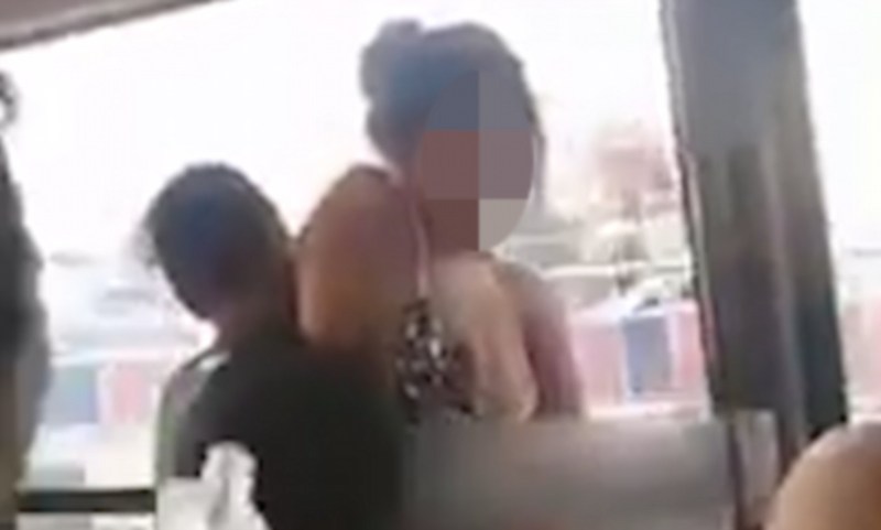 By force a girl on a bus