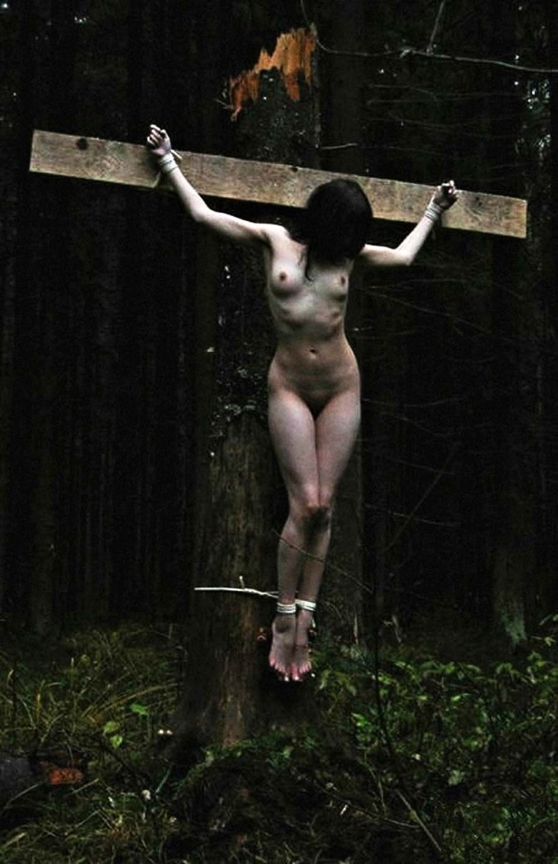 Crucified the naked woman BDSM