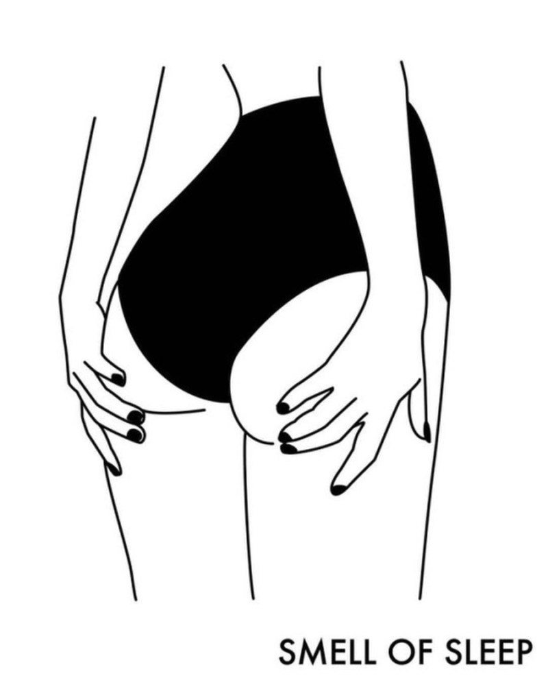 Nude blonde lies on the floor