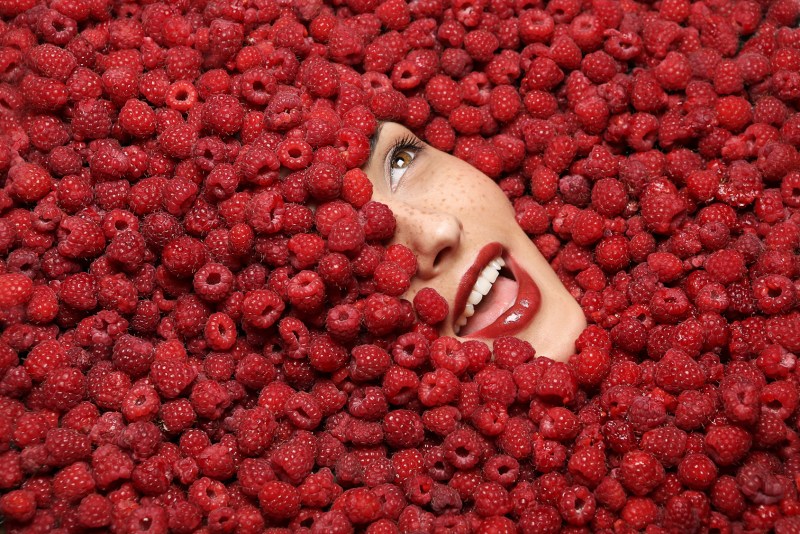 Buckets with a large strawberry