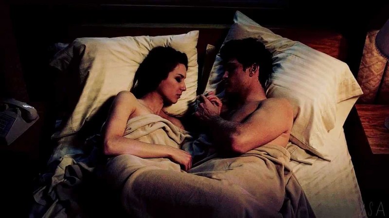 Tender hugs in bed GIF