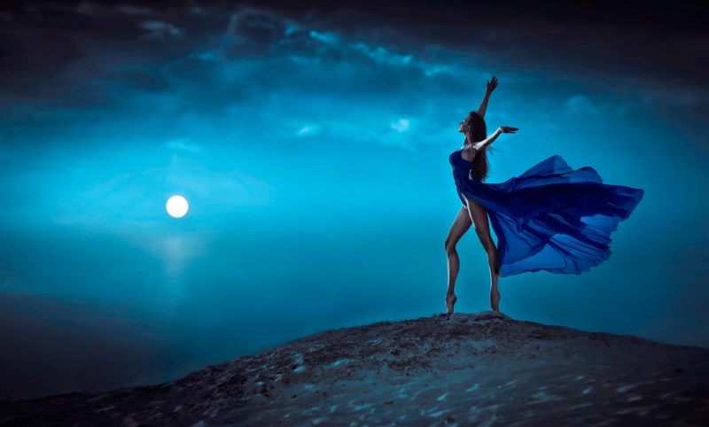 Girl in a dress in the wind