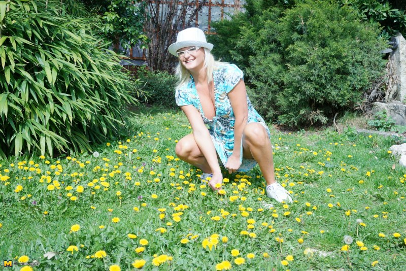 Naked adult woman in the garden