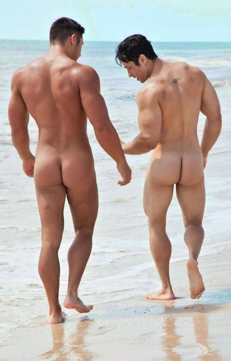 Beautiful naked men on the beach