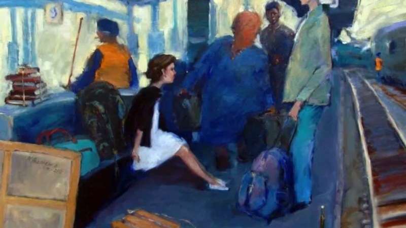 On a train in a mini dress