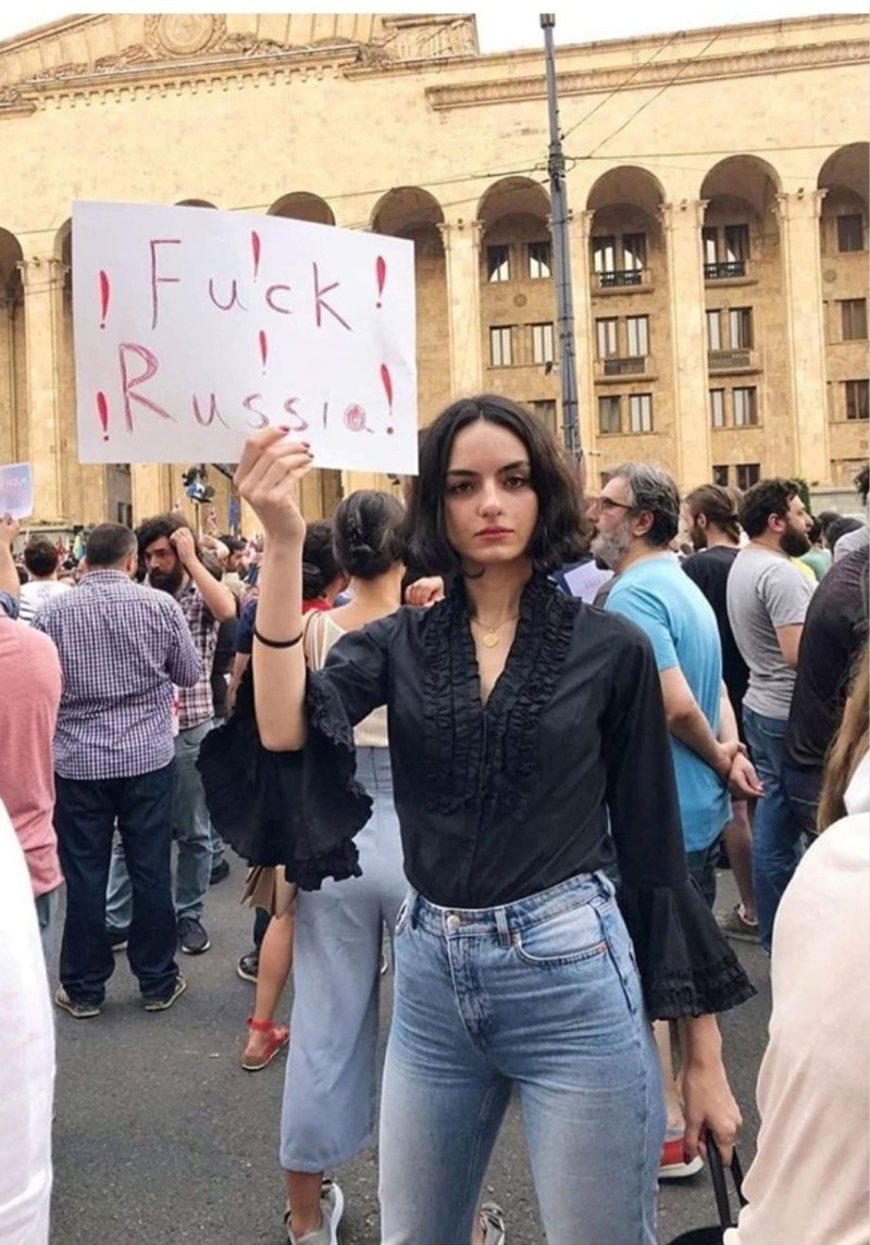 Georgian girl with a poster