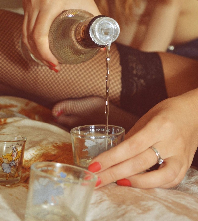 Glass in the hand of the girl