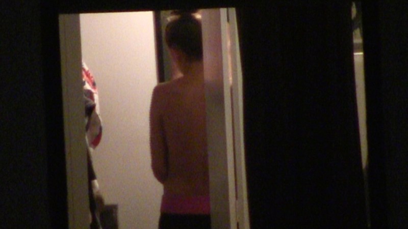 Naked in the windows of neighboring houses