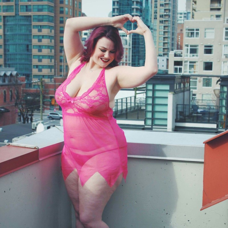 Fat girl in front of the mirror