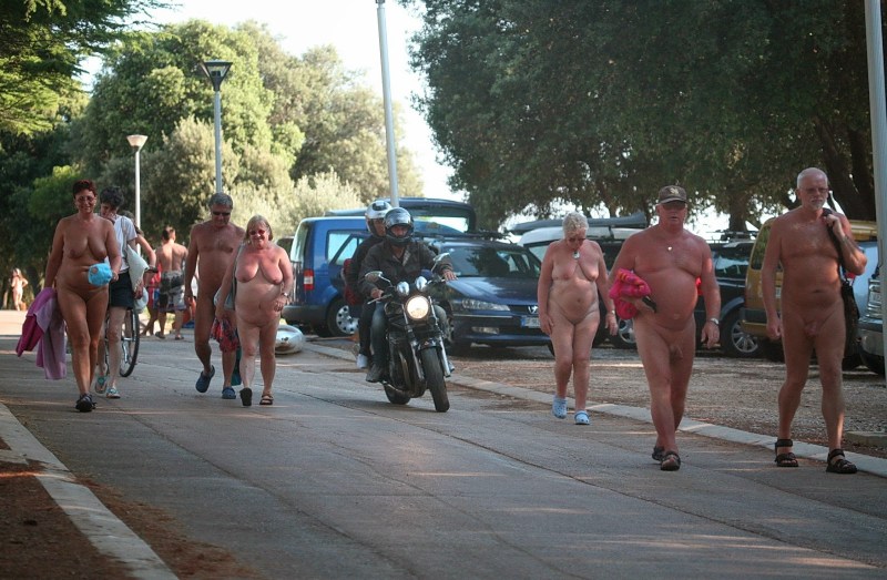 Naked with parents on the beach